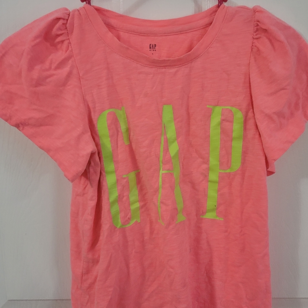 Neon peach shirt with neon letters